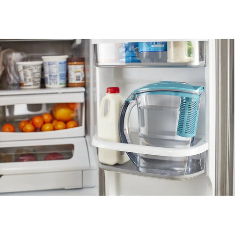 10 Cup Water Filter Pitcher With One Stream Filter For Tap Water, BPA Free, Lake Blue in fridge beside milk jug