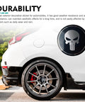 Beater Proof Full Set 4 Piece Wheel Center Hub Cap Covers Heavy Duty Steel Fits 56Mm Rims on car with skull design.