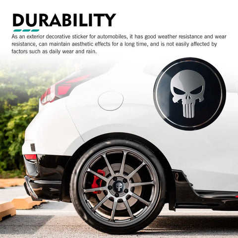Beater Proof Full Set 4 Piece Wheel Center Hub Cap Covers Heavy Duty Steel Fits 56Mm Rims on car with skull design.
