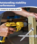 Person using drill to install heavy duty joist hanger screws for framing No. 9 by 1-1/2 inch construction screws