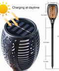 Solar Torch Light With Flickering Flame Dancing Flame Outdoor Lanterns Waterproof showing solar panel charging