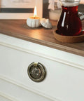Vintage Oil Rubbed Bronze Ring Pulls for Cabinets and Drawers, 2 Inch Diameter, shown on white dresser with candle and drink