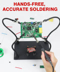 Adjustable Soldering Helping Hands with Four Magnetized Pillars and Flexible Arms on Steel Base in use for PCB assembly.