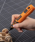 Hand using Mini Cordless Rotary Tool Kit With 3 Speed Settings And 50 Accessories, 3.7V Rechargeable Rotary Tool for crafting