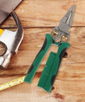Rock Solid Multi Function Wire Strippers With Voltage Tester And Cutters slick non-slip grip heavy duty stainless steel electrician pliers on wood surface.