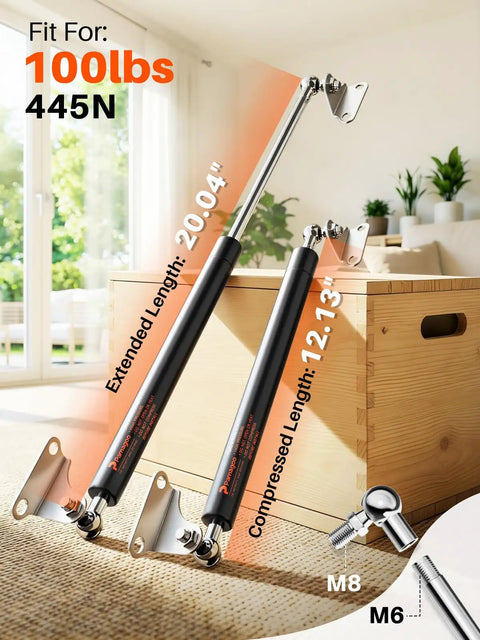 Heavy Duty 20 Inch Gas Struts For Lids And Hatches, 100 Lb Capacity displayed on wooden surface indoors