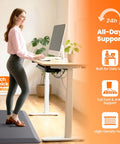 Woman using Ultra Thick 1 Inch Anti Fatigue Kitchen Mat For Floor, Non Slip And Waterproof Cushioning, Perfect For Cooking, Cleaning Or Desk Work , 20 X 39 Inches, Grey, Built To Last And Easy To Clean at standing desk