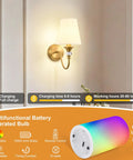 Battery Operated Wall Sconces Set of 2,Rechargeable Wireless Wall Sconces with 10000mAh RGB Dimmable Bulb and Remote,Gold sconce with white shade on wall.
