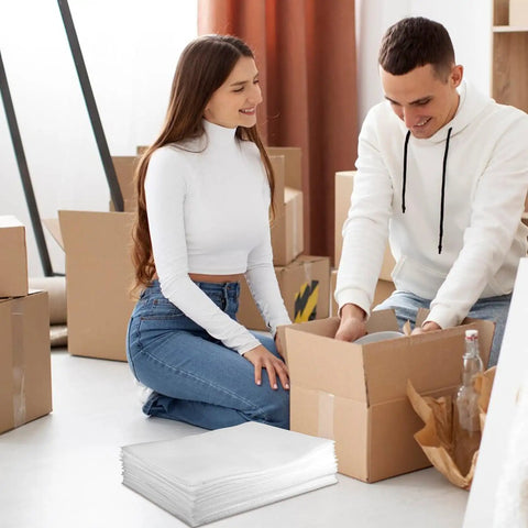 Couple packing with Bulk 100-Piece White EPE Foam Pouch Packing Kit With Cushion Wraps For Glassware And Fragile Items Protecting