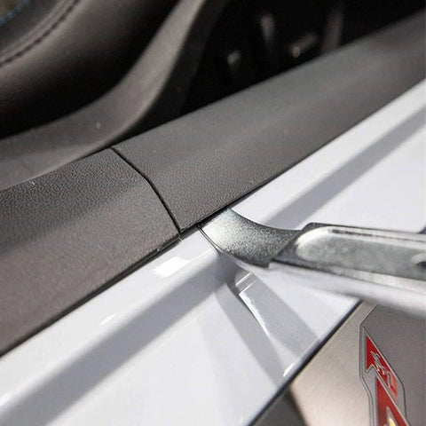 4140 Steel Automotive Pry Tool For Trim Panels And Fasteners removing a car trim panel with ergonomic curved tip.