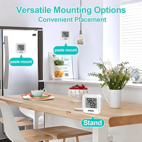 4 Pack Digital Hygrometer And Indoor Thermometer For Home And Nursery, Accurate Room Temperature Monitor With Humidity Sensor, Easy Emoji Display For Quick Readouts And Enhanced Comfort In Any Space. Mounted and standing digital hygrometers in a kitchen.