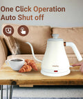 Stainless Steel Gooseneck Electric Kettle for Pour Over Coffee, Fast 1000W Heating, Auto Shut Off, 27 Fl Oz Milk White on table