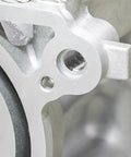 Close-up of installed Wire Thread Inserts 10-32 UNF Helical Coiled Type 304 Stainless Steel Thread Repair Kit in mechanical equipment