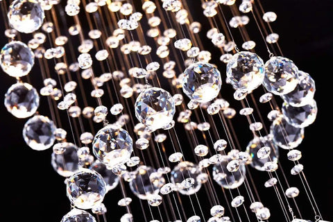 Close-up of K9 crystals on 5 Light Modern Raindrop Crystal Chandelier With Tall Height Chrome Canopy GU10 Bulb Ready LED Compatible for living room.