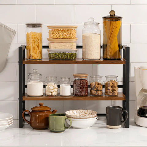 Two Tier Wood Desk Shelf Organizer with jars and dishes on a kitchen counter, space saving desktop bookshelf and storage rack