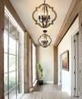 Rustic 4 Light Orb Chandelier Handcrafted From Solid Wood With Black Metal Details Ideal For Dining Room Kitchen Island Hallway Or Entryway Delivers Cozy Warm Farmhouse Glow And Modern Farmhouse Charm above a hallway