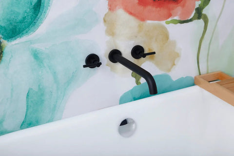 Wall Mount Tub Filler With Two Handles, Extra Long 11 Inch Spout Reach, High Flow Bathtub Faucet, Brass Rough In Valve Included, Matte Black Finish, Lead Free Brass against floral wall