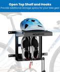 Bike Wall Mount Rack With Shelf And Hooks For Indoor Garage in black finish holding a bike helmet and shoes, showing space-saving design.