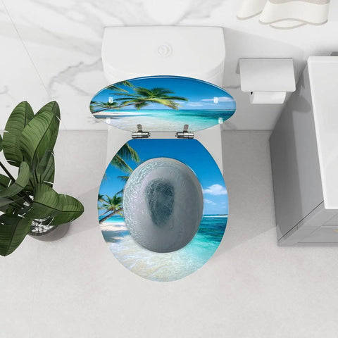 Durable Resin Round Toilet Seat Cover Adorned With Tropical Beach Thatched Roof Umbrella Graphics Quick Release Pins and smooth self-closing lids in a bathroom setting.