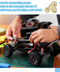 Person assembling RC car with Brass Shaft Coupling 4mm To 5mm Kit With 8 Couplers 16 Screws And Spanner