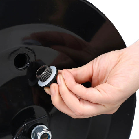 Close-up of hand using drain plug on Beefy Iron Lawn Roller With 26 Gal Capacity And 220 Lb Load For Tough Yard Work, 40 Inch Wide