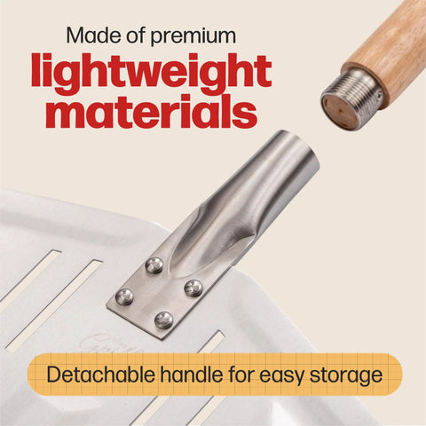 Close-up of pizza peel with perforated stainless-steel paddle and detachable wooden handle