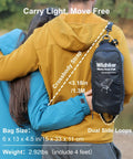 Couple carrying Ultralight Backpacking Chair For Adults With Pouch, shown in compact bag worn crossbody, weighs 2.8 lbs