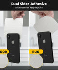 8 Pack Non Slip Rug Grippers For Hardwood Floors Washable And Reusable Carpet Tape shown holding a phone upright on a countertop