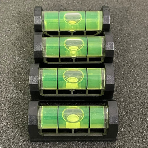 2Pack Magnetic Bubble Levels With Heavy Duty Iron Grip Solid Acrylic Spirit Level for precise wall leveling, black and green design.