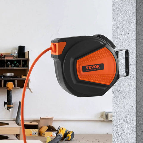 Retractable Air Hose Reel With Three Eighths Inch By Fifty Foot Hybrid Hose Up To 300 PSI For All Your Air Tools, wall-mounted in workshop.