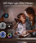 Mother and child reading with 8000mAh Portable Stroller Fan With Ultra Long Battery Life illuminating with LED night light