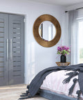 Bedroom with modern decor featuring double doors and stylish furniture.