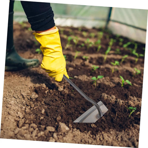 Garden hoe loosening soil, part of a 4-Piece Garden Hoe Set For Weeding And Soil Loosening, Durable Hand Tools For Digging