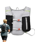 Lightweight Hydration Pack For Running And Cycling, Adjustable Reflective Vest with zip pockets, breathable mesh, shown in use