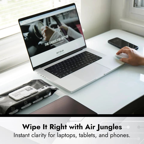 Air Jungles electronic screen wipes package on white desk beside laptop and phone