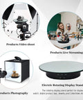 Qinmay 360 Degree Rotating Display Stand With Remote Control And Five PVC Backgrounds For ECommerce Product Photography Shoots battery powered rotating display for product videos and photography.