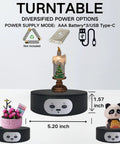 This sleek motorized rotating display stand is the ultimate sidekick for your photoshoots and shop window needs. It spins a smooth 360 degrees on its electric turntable, effortlessly handling tumblers, jewelry, and watches with up to eleven pounds of. Features decorative items on a black turntable, measuring 5.20 inches wide.
