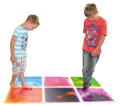 Children standing on Liquid Sensory Floor Tiles 15.8 Inch Square 4 Pack Colorful Fun Non-Toxic Liquid Moves With Every Step