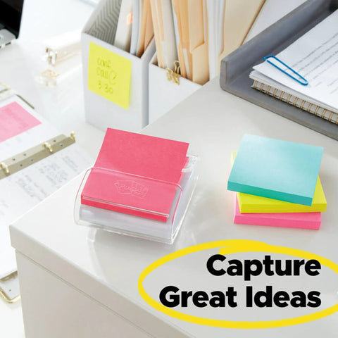 Kickass 3x3 Inch Pop Up Dispenser Notes 12 Pack on a desk, featuring colorful sticky notes for capturing great ideas.