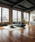 Spacious industrial living room showcasing Warm Rustic Walnut Oil Based Interior Wood Stain on wide hardwood flooring.
