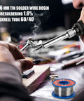 Person using 60W Soldering Iron Kit With 5 Interchangeable Tips And 10 In 1 Adjustable Temperature Soldering Tool For Electronics Repair Fast Heat 110V Perfect For DIY Hobbyists And Professional Electronics Repair Projects on a circuit board