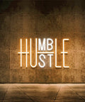 Dope Hustle Neon Sign USB Powered Wall Decor With Dimmer Switch And Adjustable Brightness For Office Gym Home Bar Man Cave Humble Vibes In Yellow And White Energy Efficient Acrylic LED Build With No Glass Breakage on concrete wall.