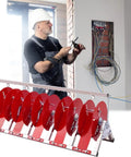 Collapsible Wire Spool Rack Cable Caddy For Easy Cable Storage, portable organizer with red reels, electrician wiring a wall