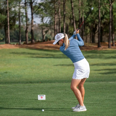 Golfer using Mevo Plus GPS Launch Monitor And Golf Simulator With Multicam Tracking on outdoor range
