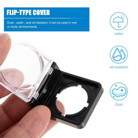 Hand holding Anti Touch Button Cover With Flip Lid Safety Guard For Industrial Workshop And Hospital Use, clear view of hinge.
