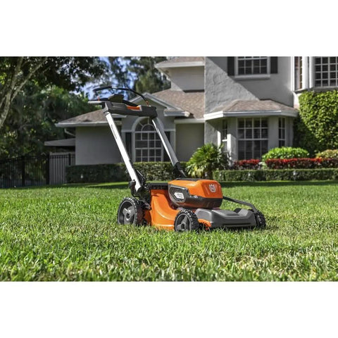 Battery Powered Self Propelled Lawn Mower With Brushless Motor For Small Yards 40V Lithium Ion Two 7.5Ah Batteries Charger Included Pro Grade Cut Long Runtime No Fuss Quick Start on grass