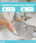 Person cleaning Stainless Steel Cat Water Fountain With 108 Oz Capacity For Cats And Small Dogs, Ultra Quiet Metal Pet Water Fountain