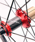 Close-up of carbon fiber tube hub in 700C Road Bike Wheelset 40mm Rim Depth Ultralight Aluminum Rim Quick Release Reflective Brake Compatible