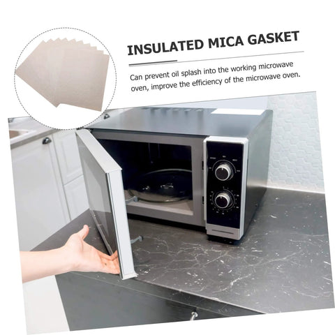 Must Have 10 Pack Mica Plate Sheets 150x120mm Heat Resistant Insulation for Microwave Ovens next to open microwave