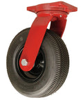 Badass Heavy Duty Swivel Caster Smooth Rolling On Any Jobsite With A Vibration Absorbing 12 Inch Pneumatic Wheel And Kingpin Less Design Built To Handle Serious Weight In Vibrant Crimson Red mounted on a black wheel.